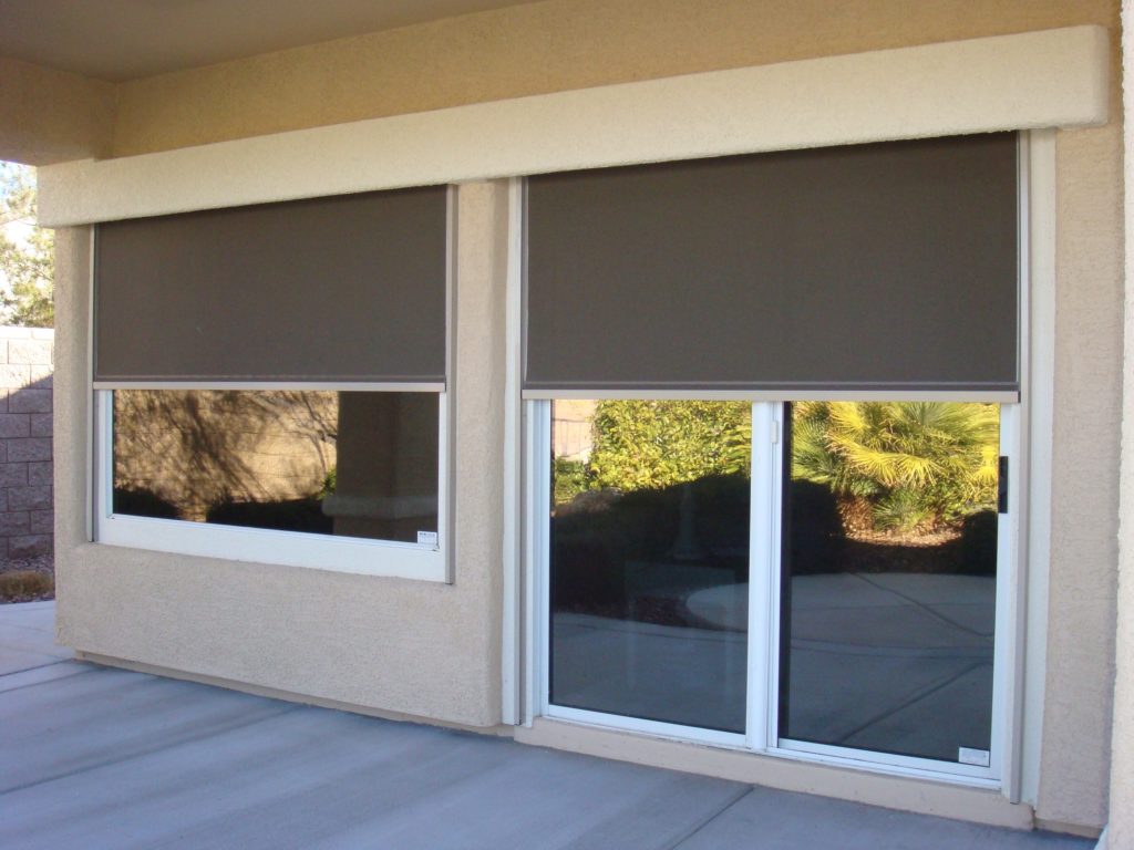 partially open retractable cable shade covering both a french door and a window